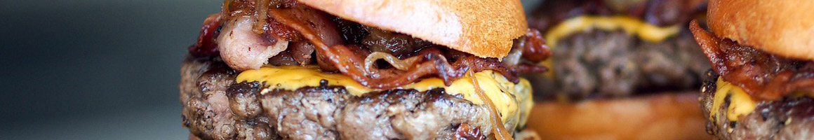 Eating Burger Hot Dog at Chicago Hamburger Co restaurant in Phoenix, AZ.